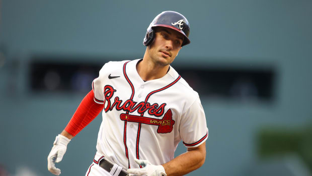 May 9, 2023; Atlanta, Georgia, USA; Atlanta Braves first baseman Matt Olson (28) hits a home run against the Boston Red Sox in the first inning at Truist Park.